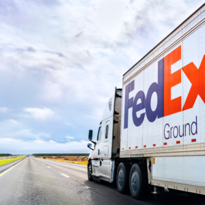 fedex truck driving on a highway