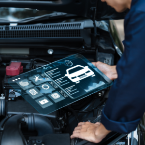 auto mechanic servicing a car