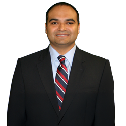 Profile headshot of Charlie D. Gibson in a black suit coat.