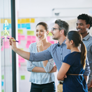 Glass wall and team of business people in office planning project management strategy.